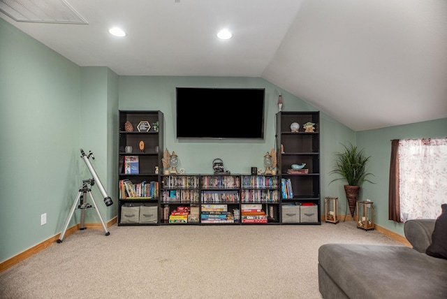 recreation room featuring carpet and lofted ceiling