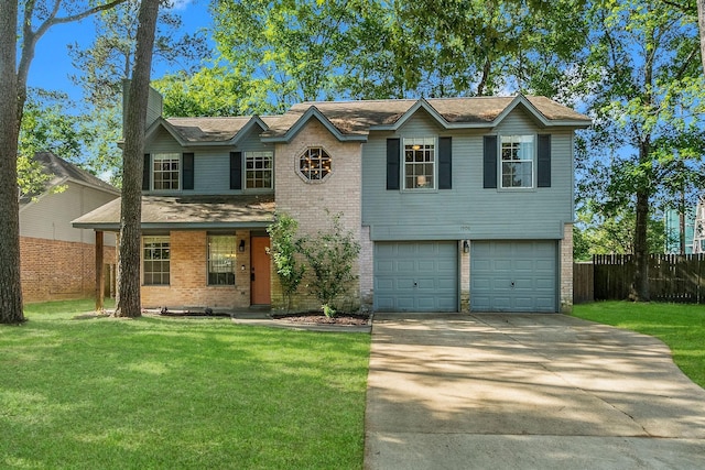 view of front of property with a garage and a front lawn