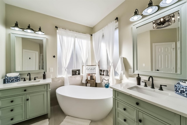 bathroom featuring vanity and a bathtub