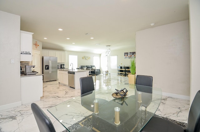 dining space with sink