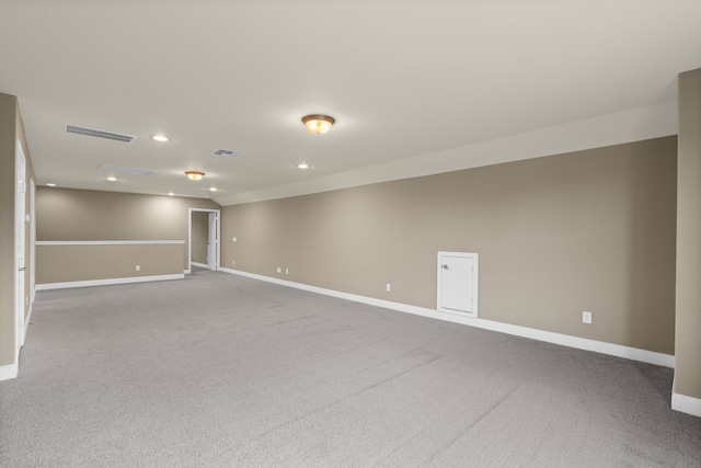 empty room featuring recessed lighting, visible vents, baseboards, and carpet floors