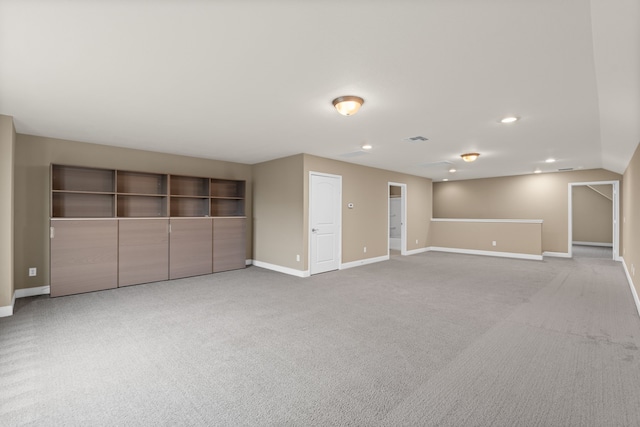 carpeted spare room with baseboards and recessed lighting
