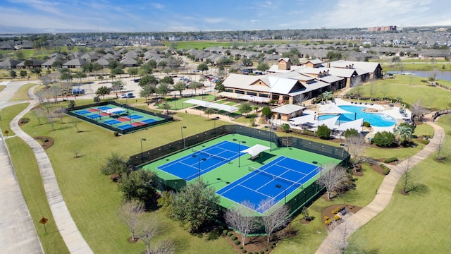 bird's eye view with a water view and a residential view