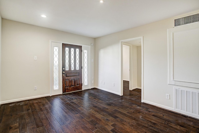 foyer entrance with dark hardwood / wood-style flooring