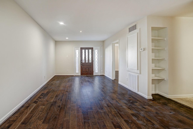 foyer featuring dark hardwood / wood-style floors