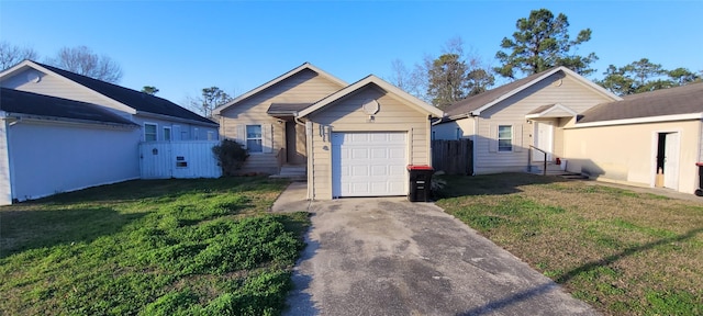 view of front of home with a garage and a front lawn