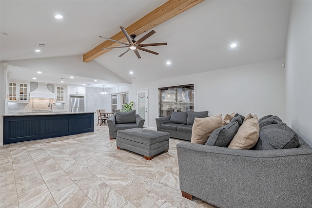 living room with beam ceiling, high vaulted ceiling, and ceiling fan