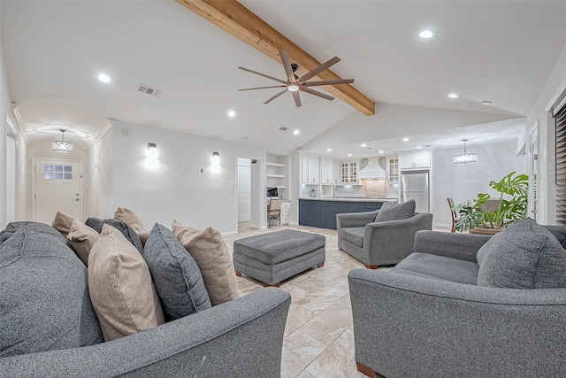 living room featuring lofted ceiling with beams, sink, ceiling fan, and built in shelves