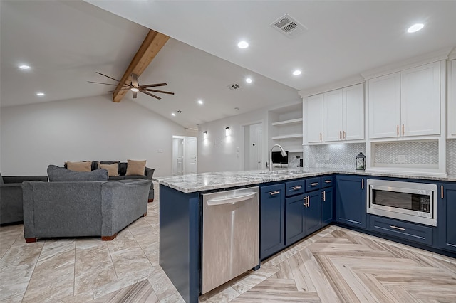 kitchen featuring blue cabinetry, sink, white cabinetry, appliances with stainless steel finishes, and light parquet floors