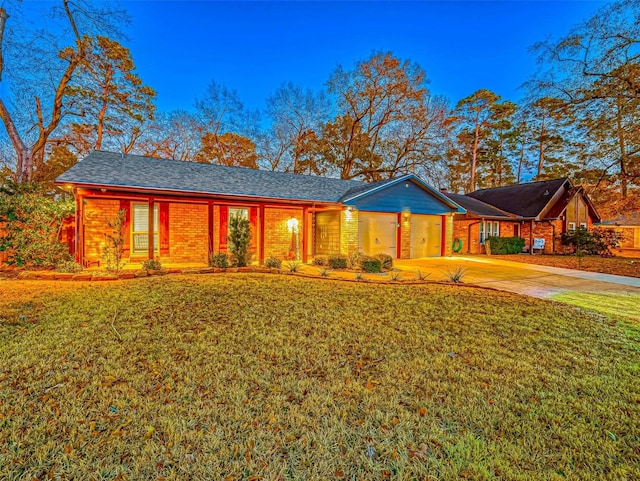 single story home with a garage and a front yard