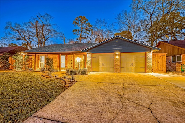 ranch-style home with a garage