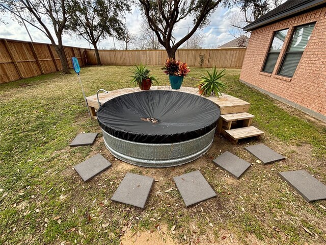 view of yard featuring a fenced backyard