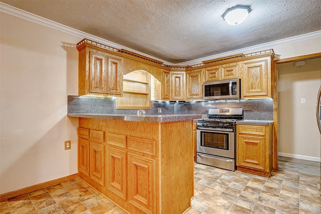 kitchen featuring backsplash, ornamental molding, and stainless steel appliances