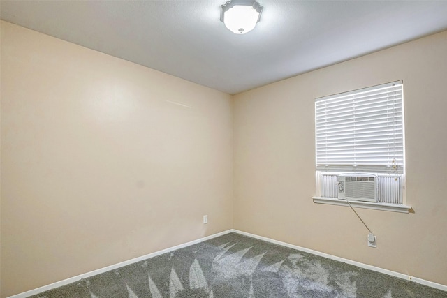 unfurnished room featuring carpet floors and cooling unit