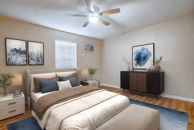 bedroom featuring wood-type flooring and ceiling fan