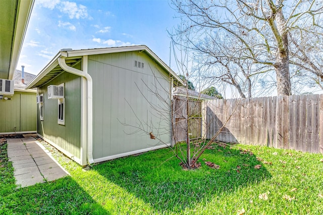 view of property exterior with a yard