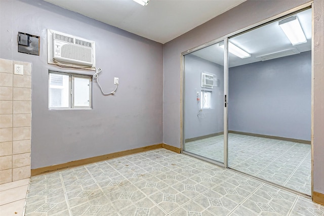 empty room featuring a wall unit AC