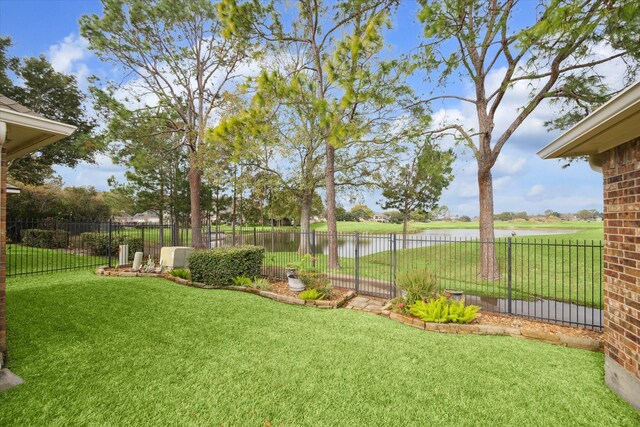 view of yard with a water view