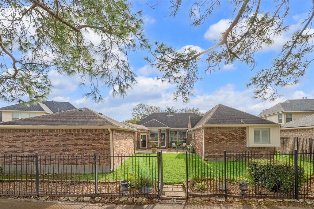 exterior space with a lawn