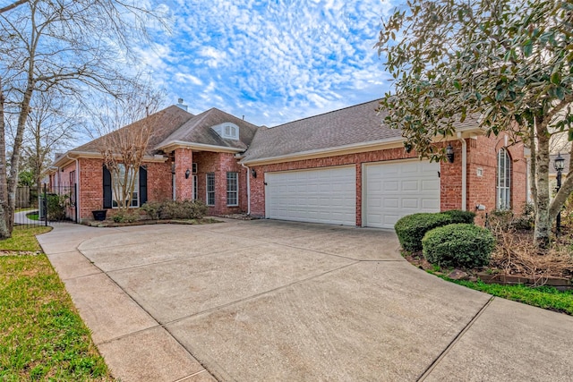 single story home featuring a garage