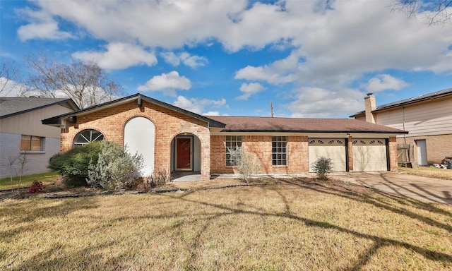 ranch-style house with a garage and a front yard