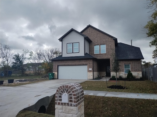 view of front of home featuring a garage, a shingled roof, concrete driveway, stone siding, and brick siding