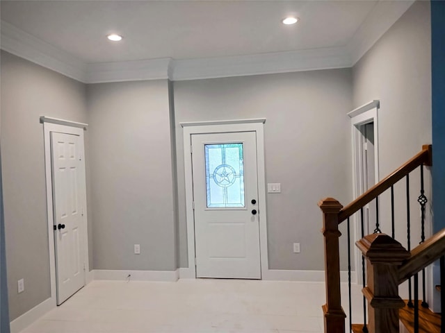 foyer entrance with recessed lighting, baseboards, stairway, and ornamental molding