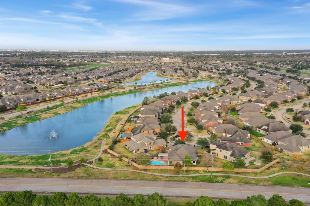 drone / aerial view with a water view