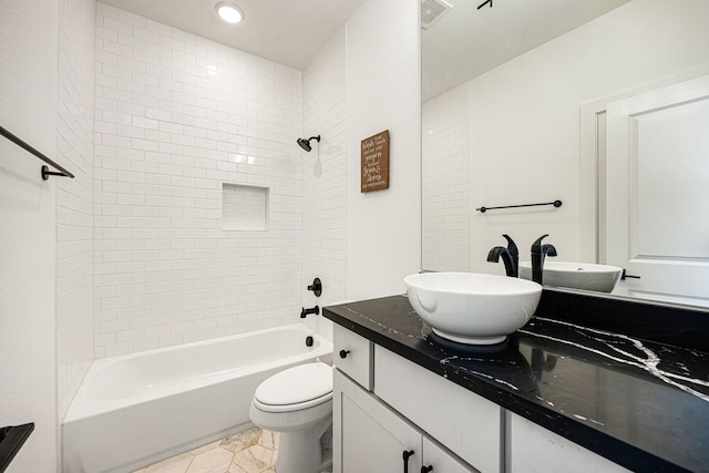 bathroom featuring visible vents, toilet, vanity, washtub / shower combination, and recessed lighting