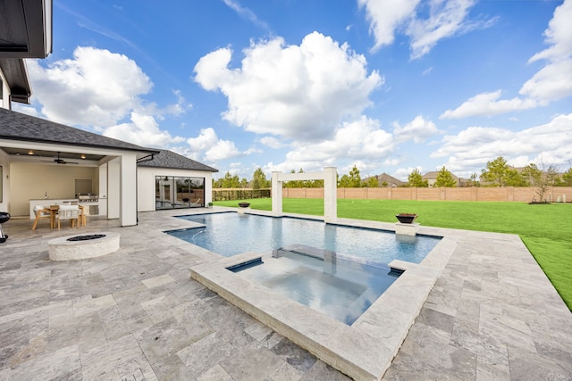 view of pool featuring a patio, an outdoor fire pit, a fenced backyard, an in ground hot tub, and a yard