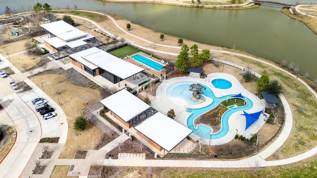 drone / aerial view featuring a water view