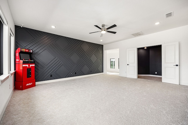 spare room featuring baseboards, visible vents, and recessed lighting