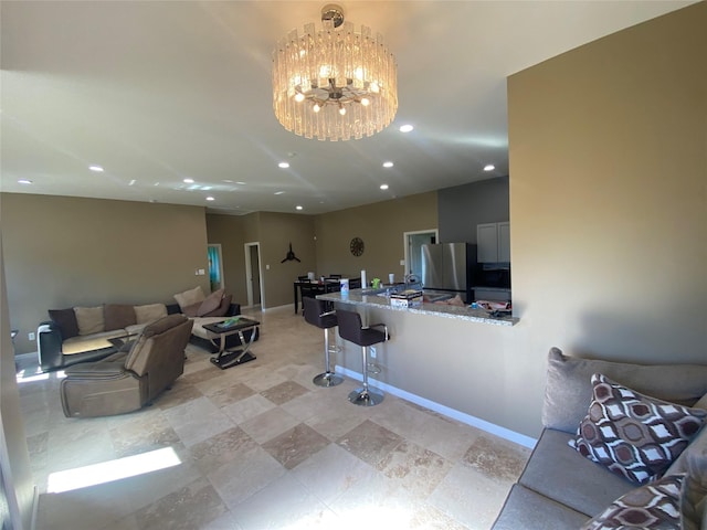 living room with a notable chandelier