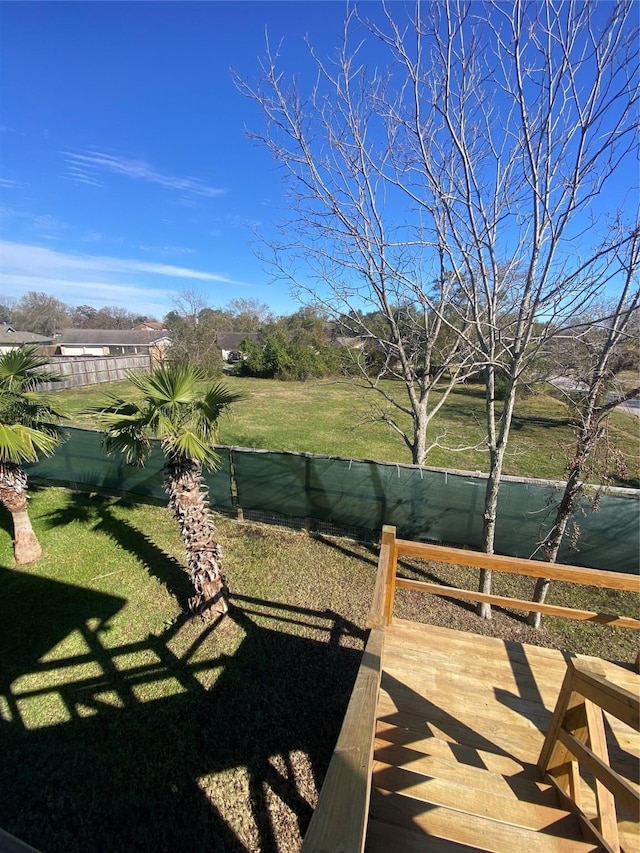 view of yard with a wooden deck