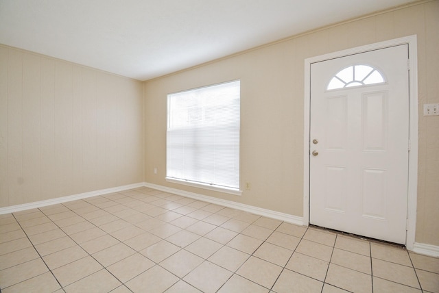 entryway with light tile patterned floors