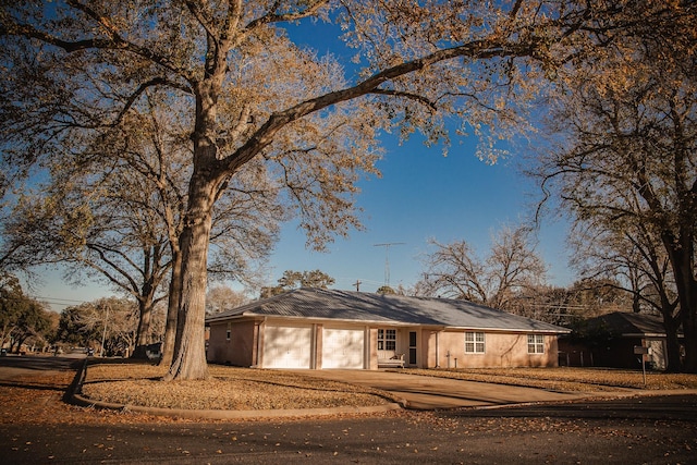 ranch-style house with a garage