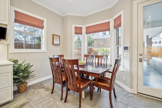 dining room with crown molding