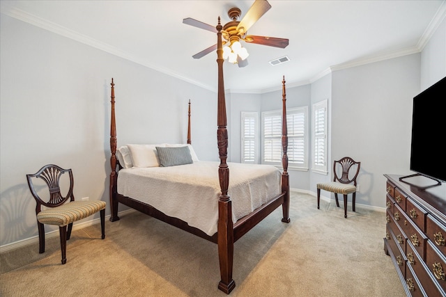 bedroom featuring crown molding, light colored carpet, and ceiling fan