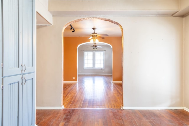 hall featuring wood-type flooring