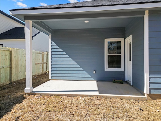 entrance to property with a patio area