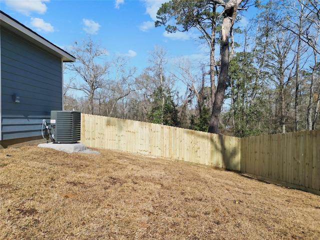 view of yard featuring central AC unit