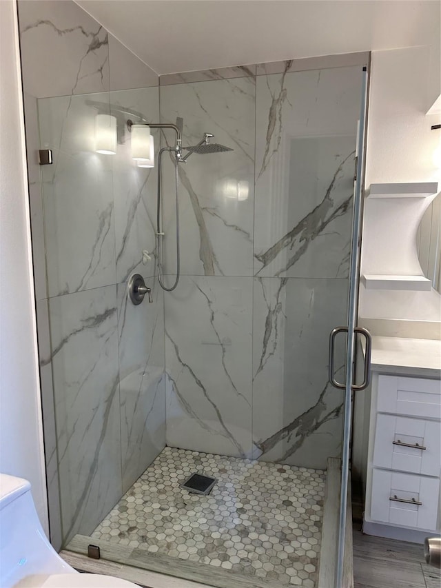 bathroom with vanity and an enclosed shower