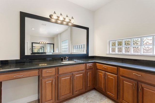 bathroom featuring tile patterned floors and vanity