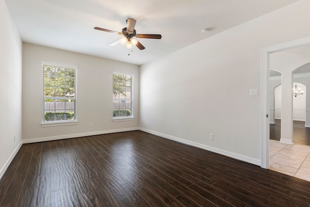 spare room featuring ceiling fan and wood-type flooring