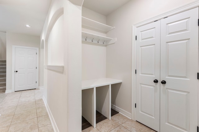 mudroom featuring light tile patterned floors