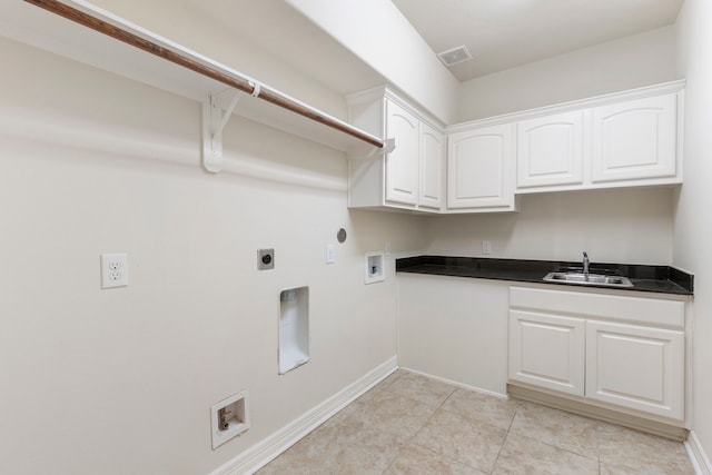 laundry room with gas dryer hookup, sink, cabinets, hookup for a washing machine, and hookup for an electric dryer