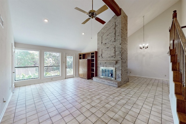 unfurnished living room featuring high vaulted ceiling, ceiling fan with notable chandelier, a brick fireplace, and light tile patterned floors