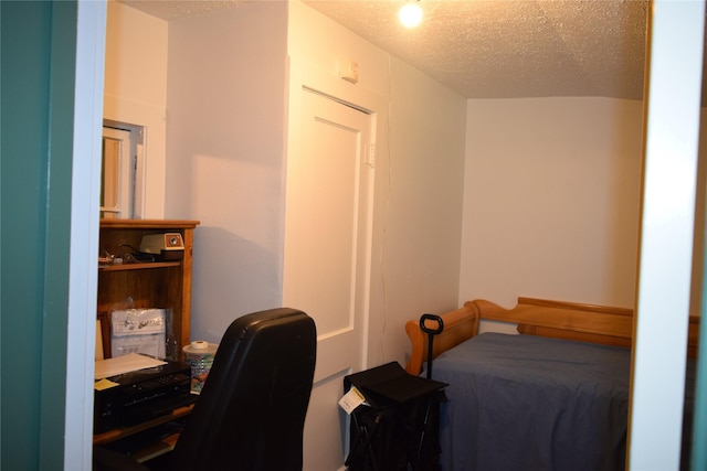 bedroom with a textured ceiling