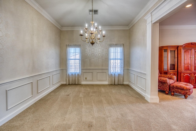 unfurnished room with ornamental molding, light colored carpet, and a notable chandelier