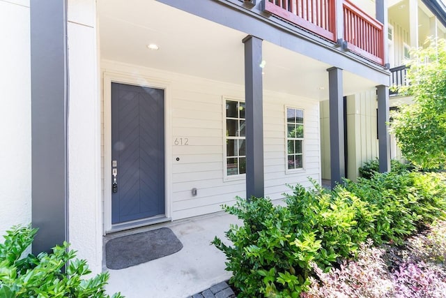 entrance to property with a balcony